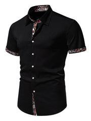 Black short sleeve buttoned shirt with paisley trim on collar, cuffs and hem