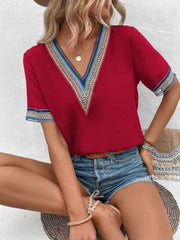 Deep Red V-neck blouse with embroidered trim on neckline and sleeves