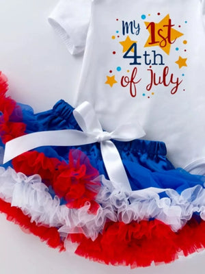 Baby patriotic outfit with "my 1st 4th of July" graphic and ruffled tutu skirt.