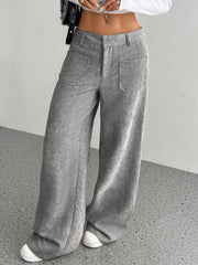 Gray corduroy wide-leg utility trousers with front patch pockets and a relaxed fit.