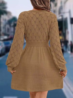 Tan openwork knit V-neck sweater dress with cinched waist and above-knee length.