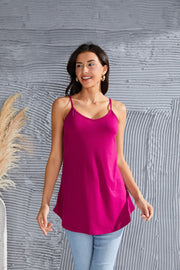 Cerise cami with spaghetti straps and curved hemline