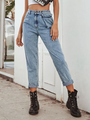 Light wash cotton barrel leg jeans with unique pocket details and cuffed hems.