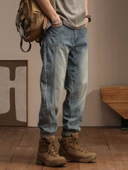 Relaxed fit vintage wash denim jeans with panel detailing and a light blue wash.