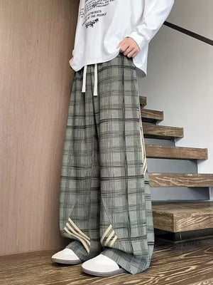 Men's gray plaid wide leg sweatpants with drawstring and side stripe detail