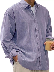 Classic corduroy button-up shirt in purple with buttoned cuffs and collar.