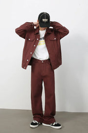 Burgundy wide-leg denim trousers with a relaxed fit.