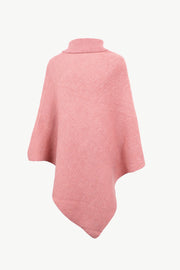 Button-detail turtleneck knit poncho in hot pink acrylic, a cozy fall layer.