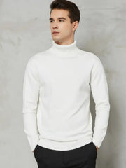 White turtleneck sweater with long sleeves and a modern silhouette.