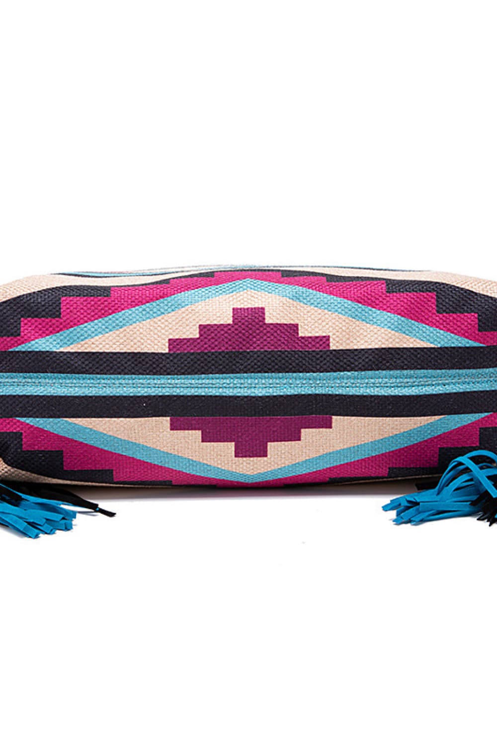 Southwestern fringe hobo bag with geometric pattern in multicolor canvas and blue fringe detail.