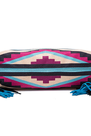 Southwestern fringe hobo bag with geometric pattern in multicolor canvas and blue fringe detail.