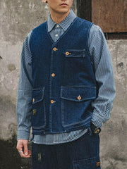 Plus-size navy denim vest with V-neck, button-up front, and four pockets.