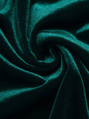 Green velvet maxi dress with ruched detail and V-neck.