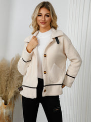 Teddy textured jacket in cream with leatherette trim and button closure.
