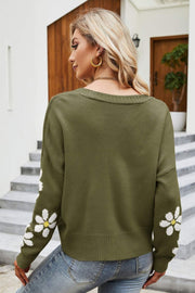 Green knit cardigan with daisy embroidery on sleeves, crew neck, acrylic.