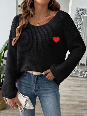 Black slouchy boatneck knit sweater with embroidered red heart detail