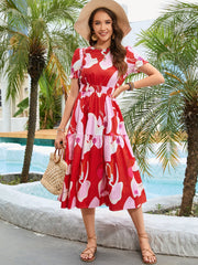 Red floral print midi dress with smocked waist and tiered skirt
