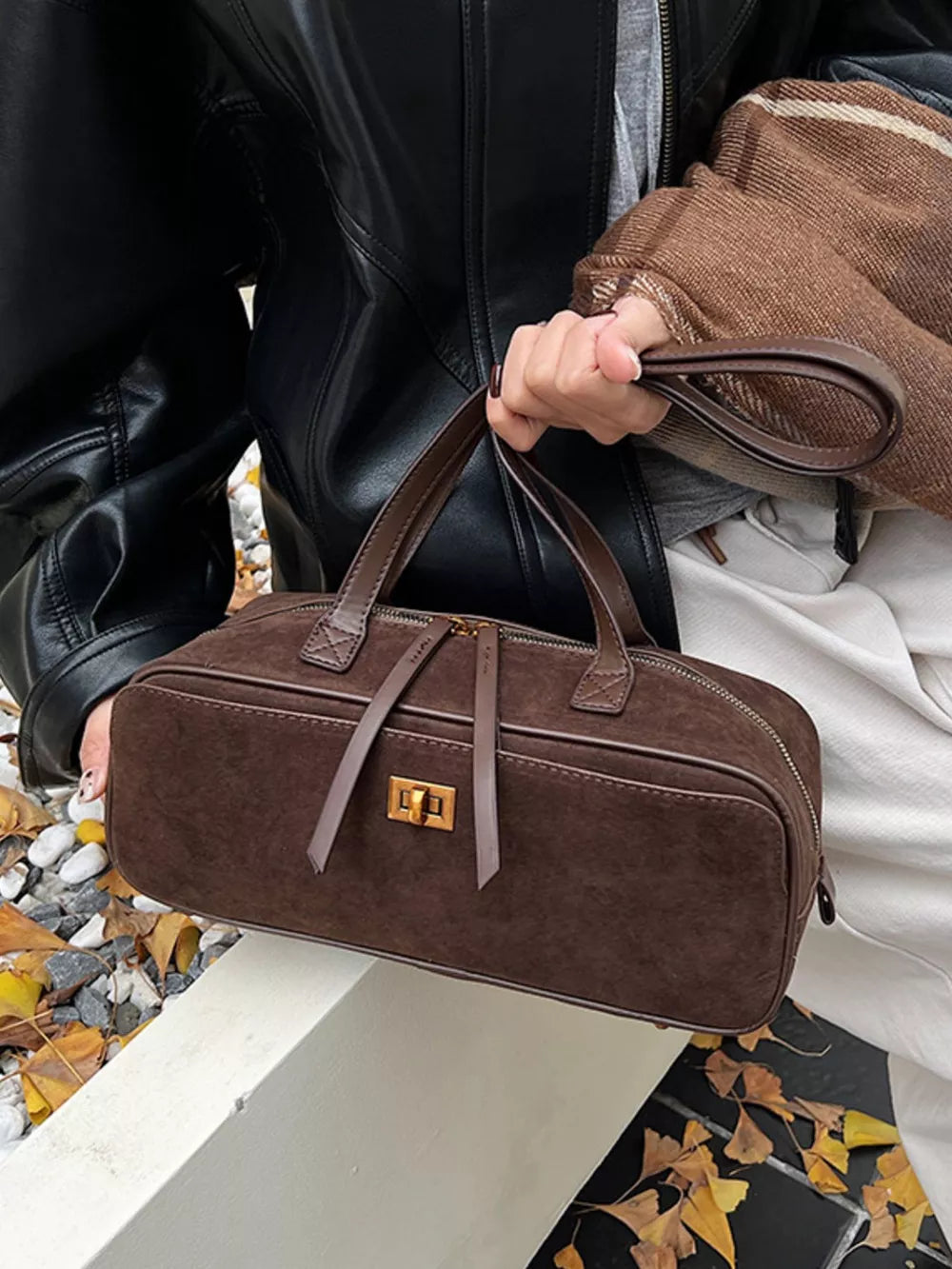 Brown suede shoulder bag with gold clasp and top handles