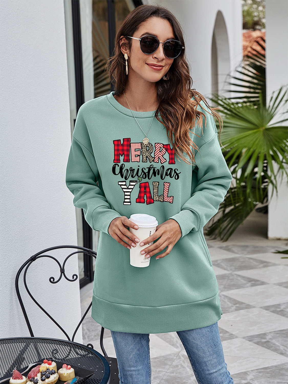 Sage oversized sweatshirt with Merry Christmas Y'all graphic, crewneck, long sleeves.