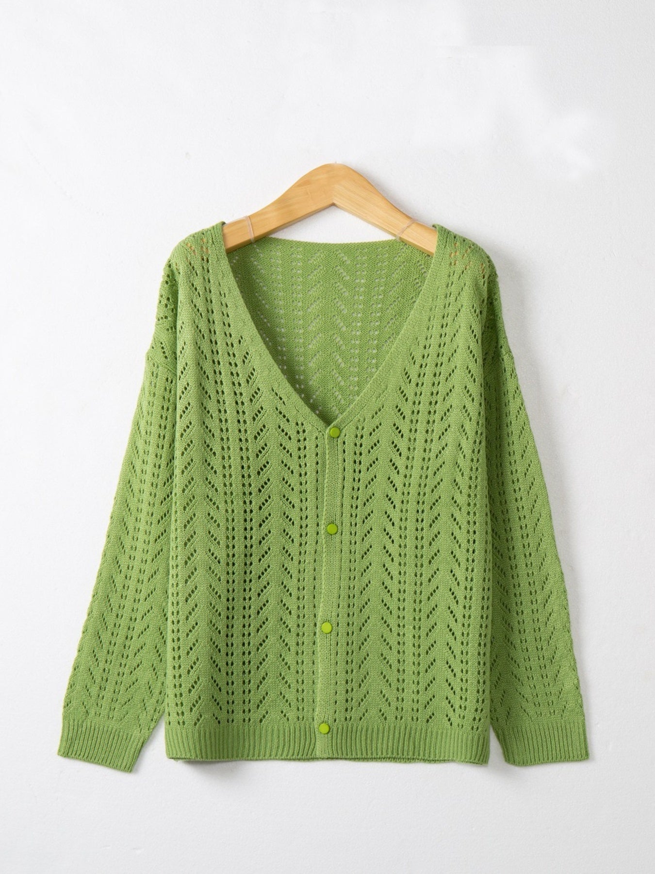 Green chevron knit lightweight cardigan with button-down front and V-neck.