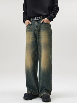 Men's wide-leg wash denim jeans in French Blue with gradient fading.