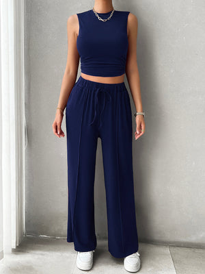 Dark blue ribbed crop top and wide-leg lounge pants with drawstring waist.