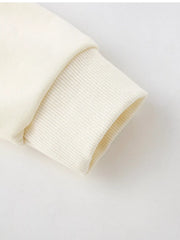 Ivory 100% cotton baby sweatshirt cuff detail