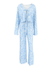Blue and white marble print lace-up lounge set with drawstring pants and long sleeves.