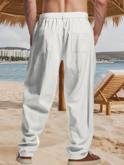 White relaxed fit sweatpants with a single back pocket and elastic waistband.