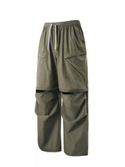 Men's convertible cargo pants in Matcha Green with adjustable drawstring waist and multiple pockets.