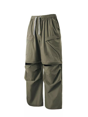 Men's convertible cargo pants in Matcha Green with adjustable drawstring waist and multiple pockets.