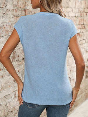 Light blue seamed knit sleeveless v-neck top with a textured finish.