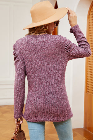 Textured knit blouse in Red-Violet with ruched sleeve detail and a ribbed finish.