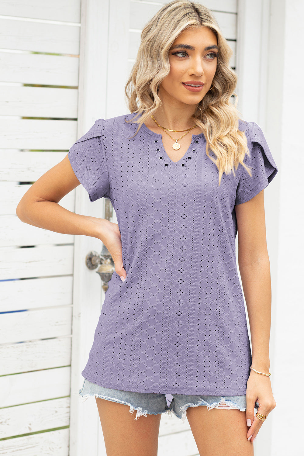 Lavender eyelet flutter sleeve blouse with V-neck and grommet detail
