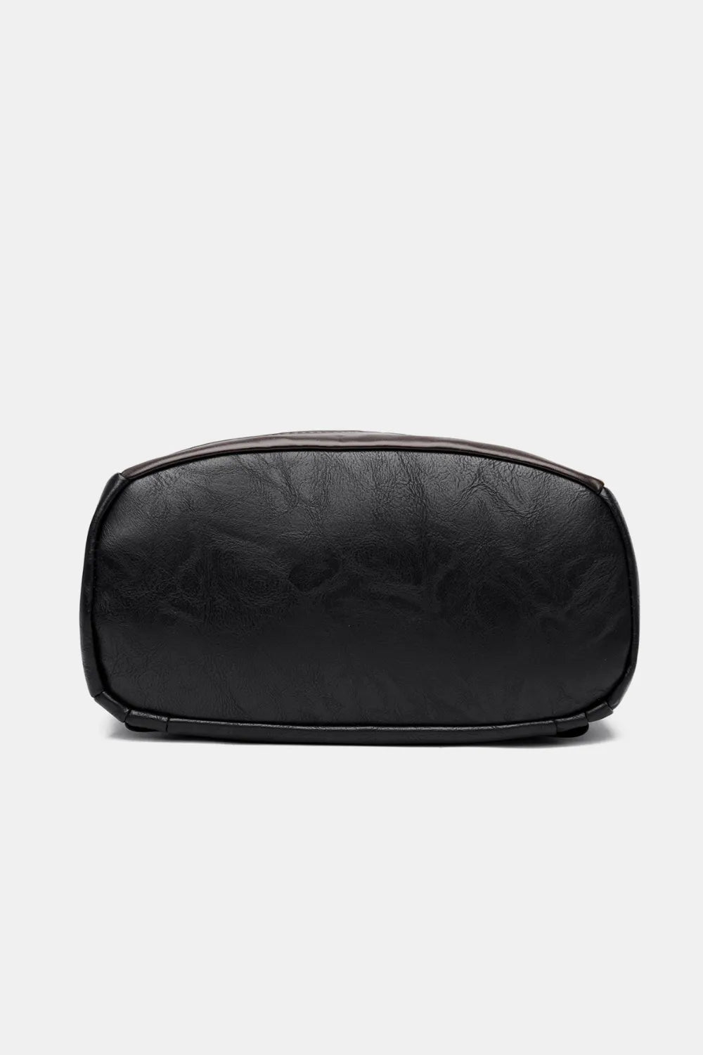 Black structured leather convertible backpack, top view detail