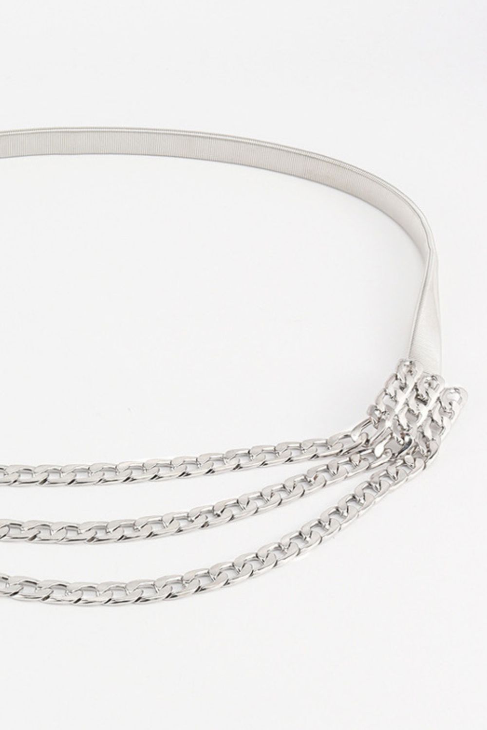 Silver chain cascade belt with elastic band and three layered curb chains.