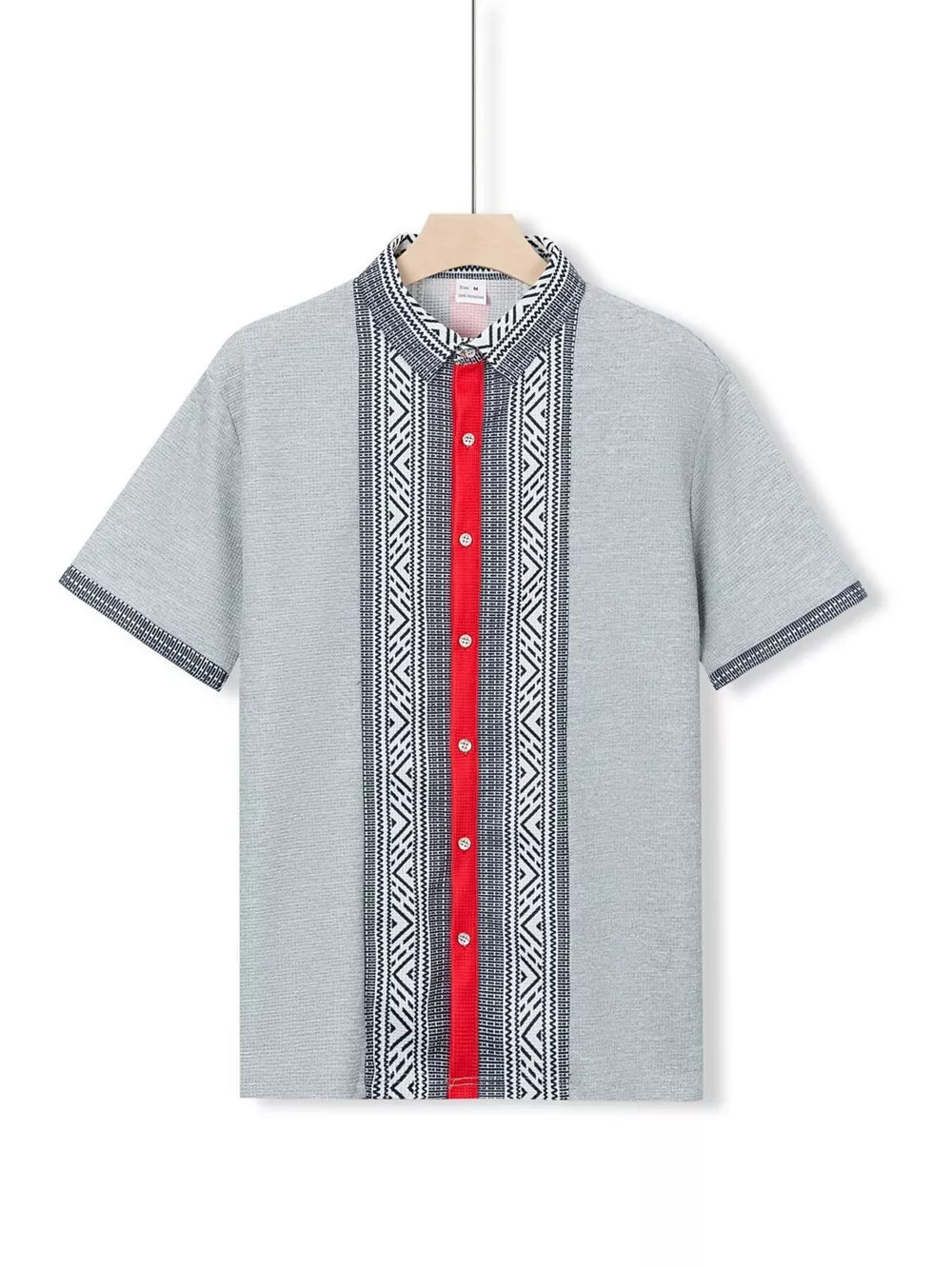 Men's gray short sleeve shirt with bold geometric print and red button placket.
