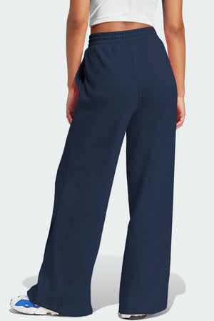 Dark navy seamed wide leg lounge trousers with elastic waist and pockets.