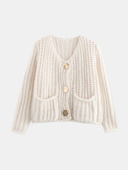 Beige chunky knit cardigan with statement buttons and patch pockets