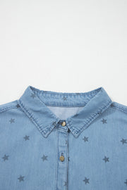 Light blue denim shirt with dark star print, button-down collar, and button front.