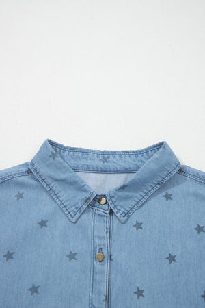 Light blue denim shirt with dark star print, button-down collar, and button front.