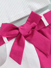 Baby girls' two-piece knit top and skirt set in rose red with a white ribbed top and a large bow detail.