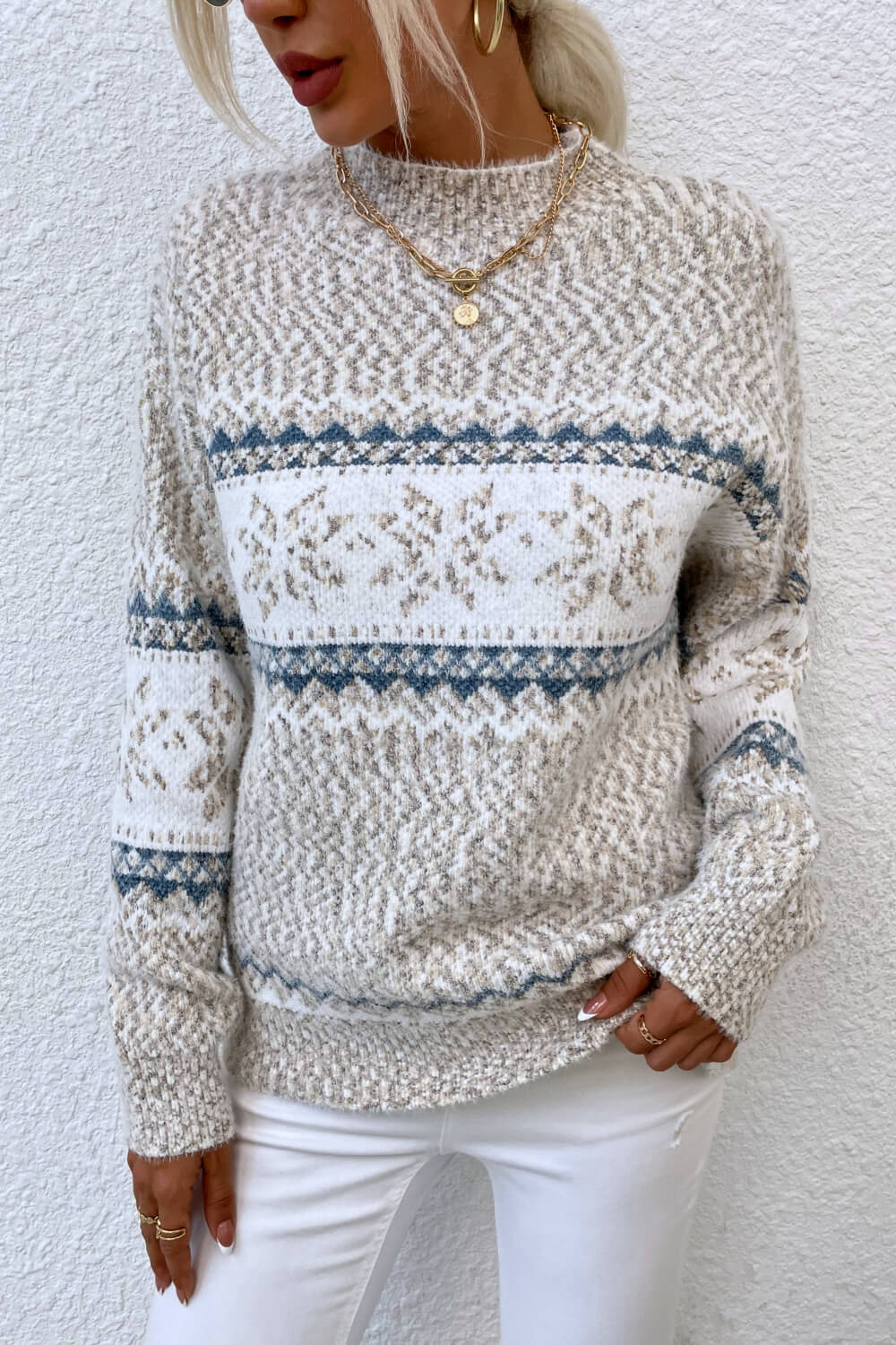 Acrylic knit sweater with Nordic Fair Isle pattern in sand and blue, mock neck.