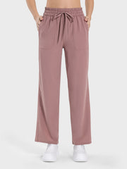 Light Mauve relaxed fit palazzo pants with drawstring waist and pockets.