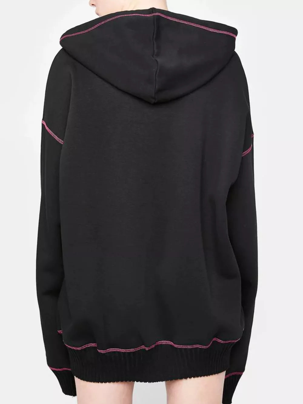 Black zip-up hoodie with playful pink contrast stitching and drawstring hood.