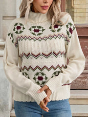 Ivory turtleneck sweater with geometric cable-knit pattern and ribbed cuffs.