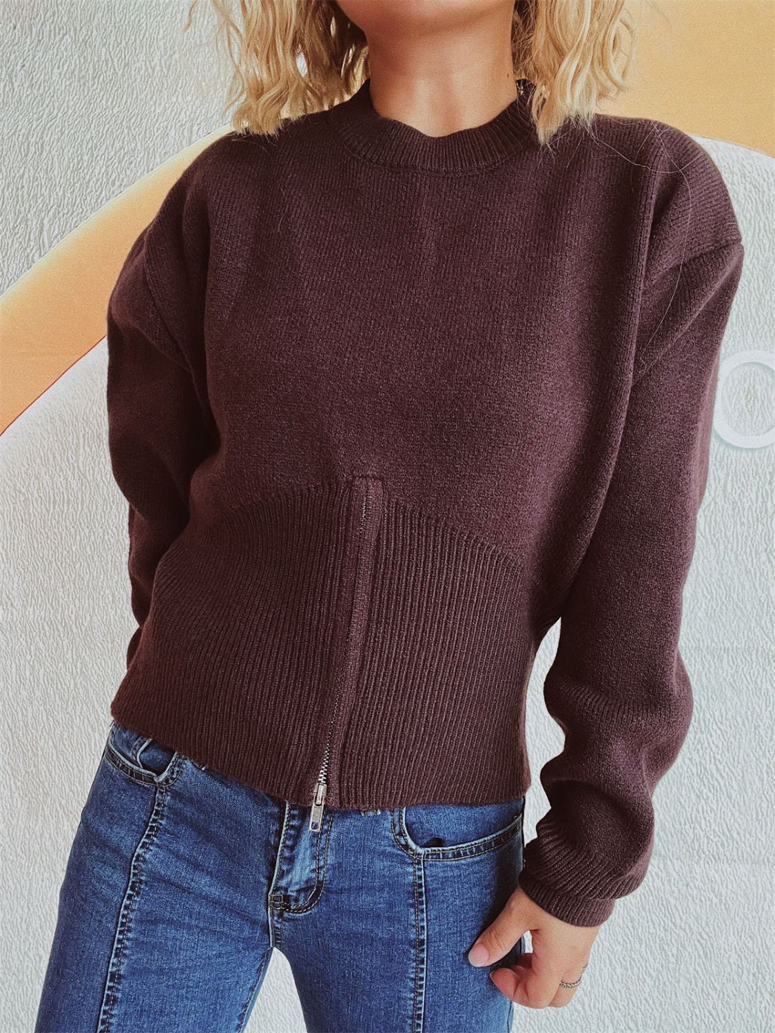 Chocolate ribbed zip-front knit sweater with mock neck and fitted hem