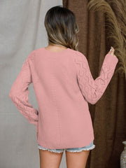 Diamond-cut raglan knit sweater in blue acrylic.