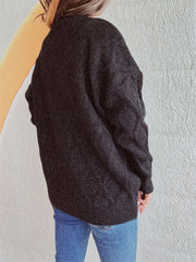 Black sparkle knit relaxed fit sweater with crewneck and long sleeves