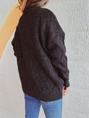Black sparkle knit relaxed fit sweater with crewneck and long sleeves